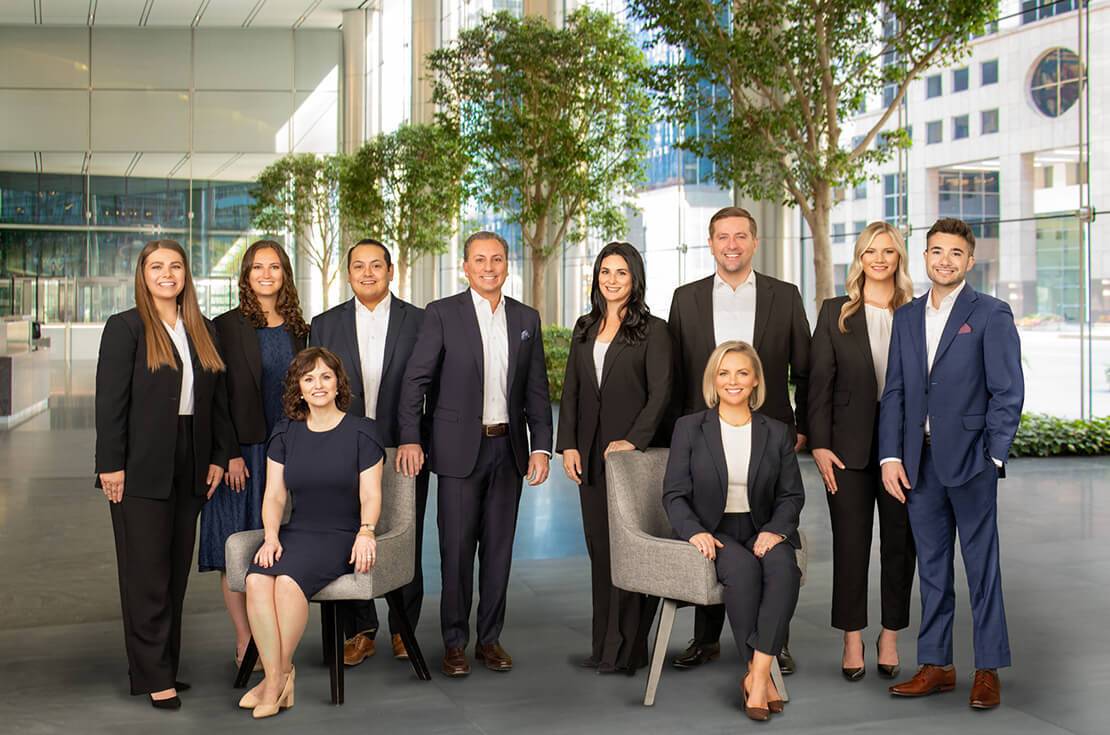 Canale Financial Group posing together in business attire
